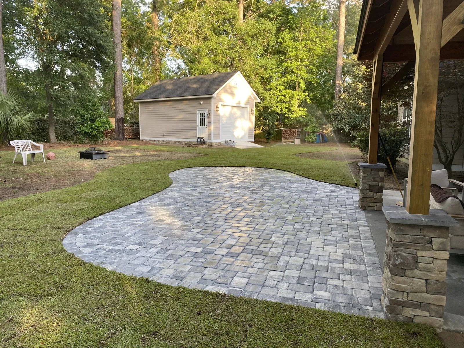 Paver patio with timber-frame pavilion