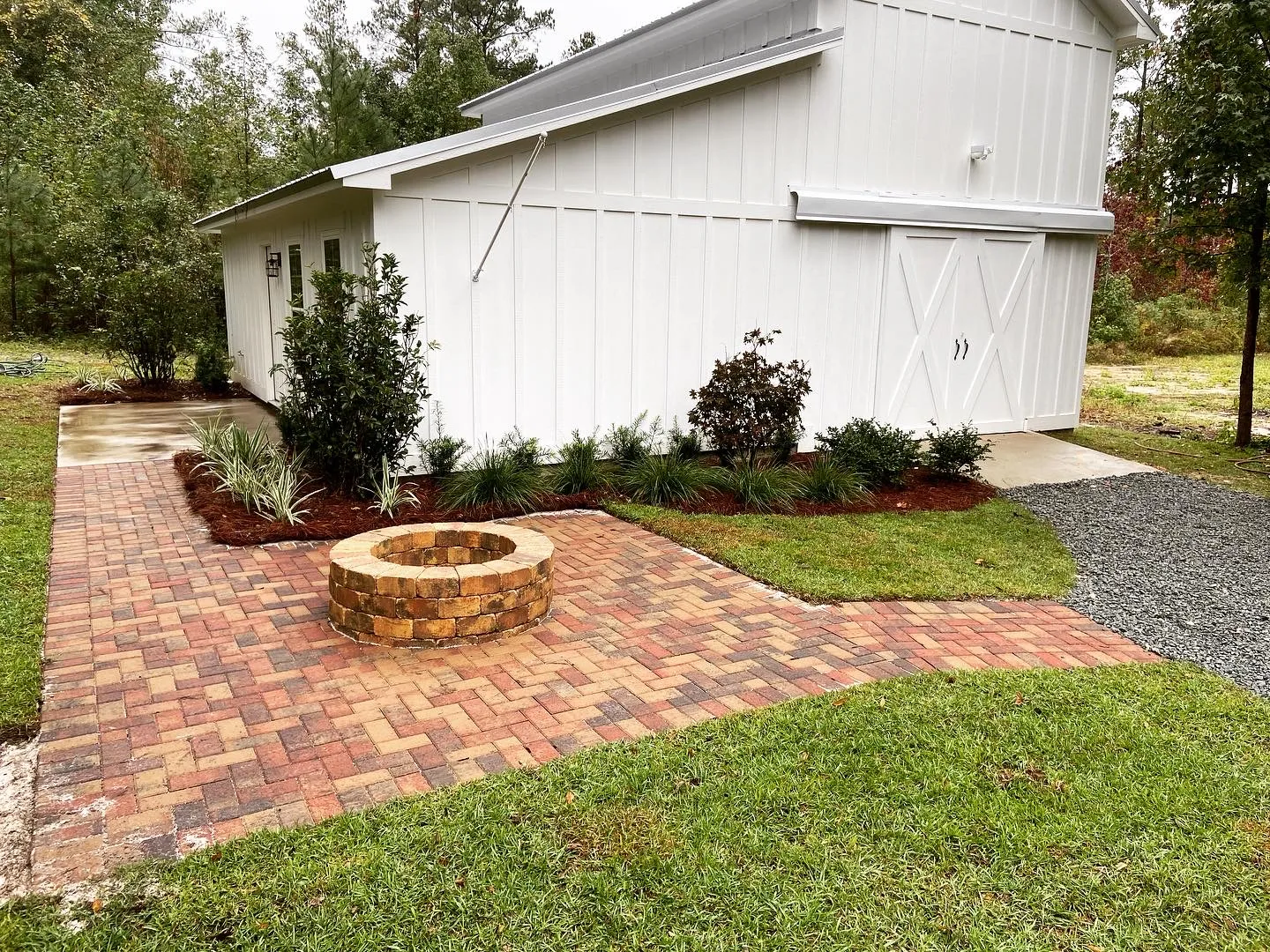 Brick paver patio with stone fire pit in Valdosta GA